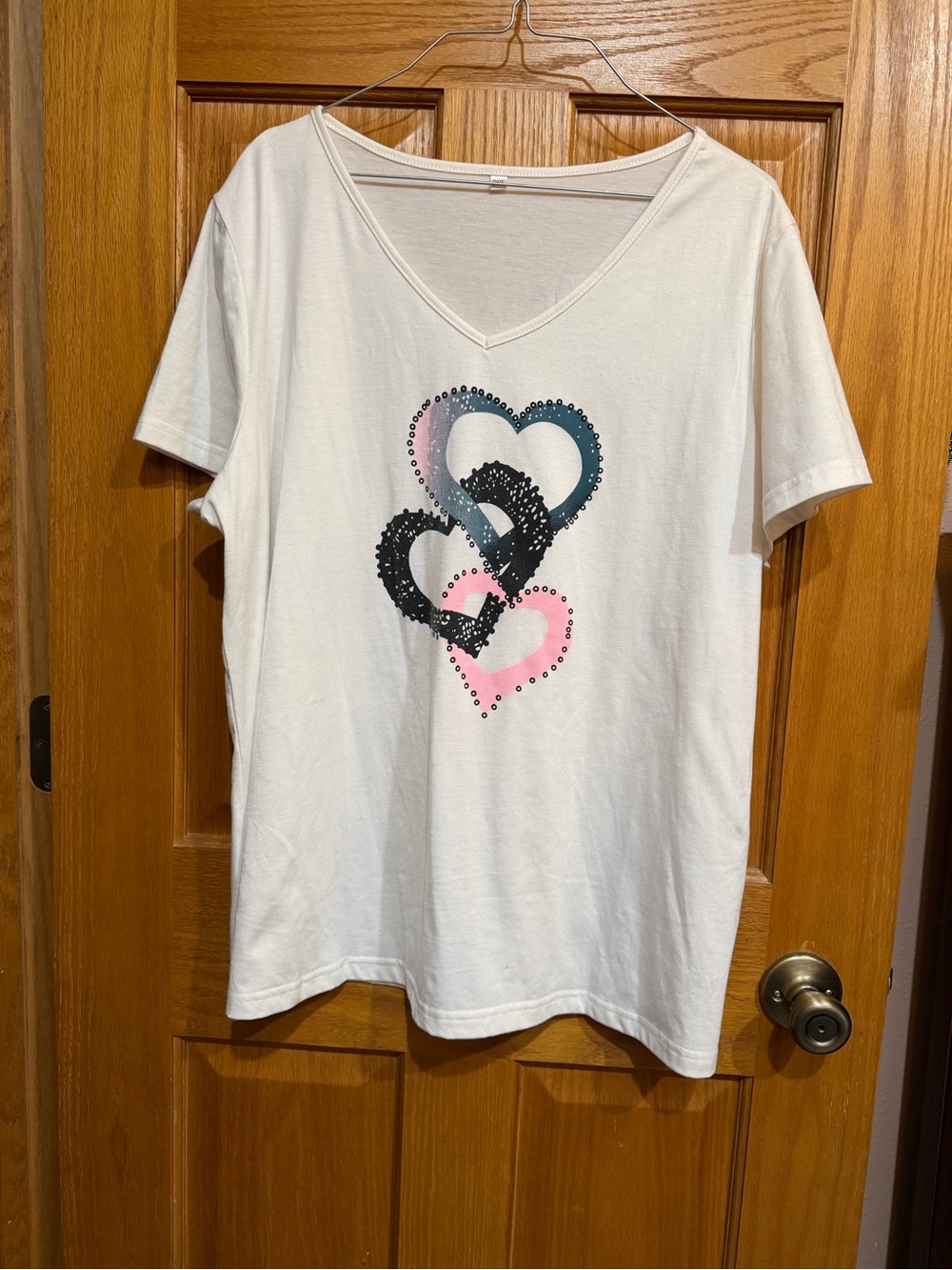 White V-Neck Tee with Pink and Blue Heart Design